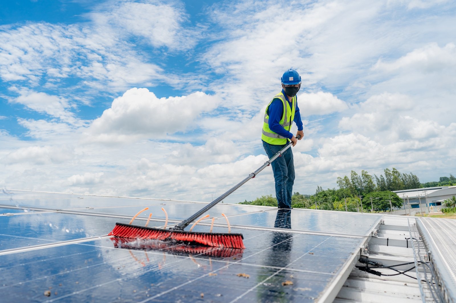 Solar roof cleaning, Professional technicians were washing and the surface of the solar panels