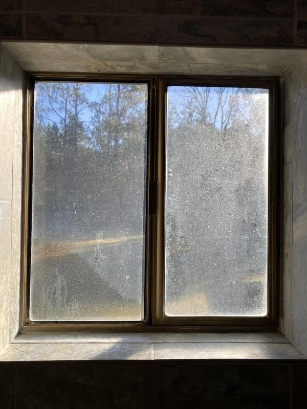 Dirty And Foggy Window Glass Before Professional Window Cleaning Service In Melbourne