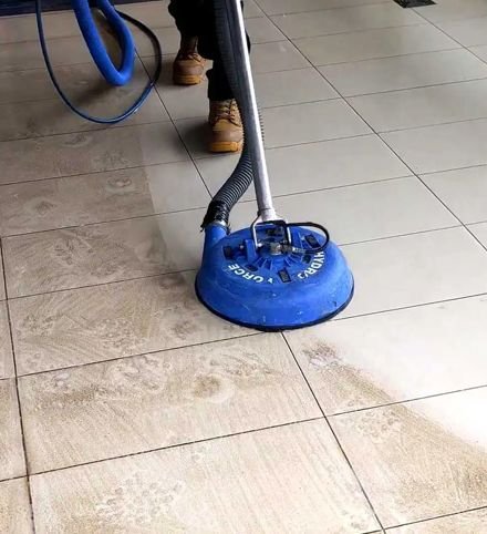 Dirty wooden surface with grease and buildup before professional deep cleaning service